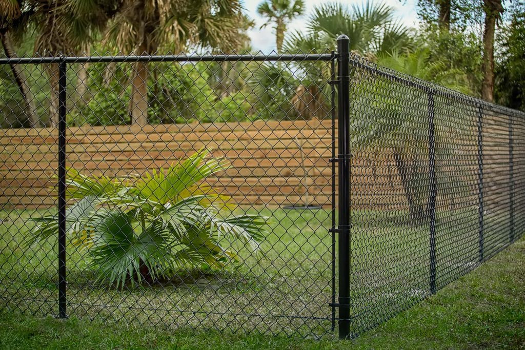 Black Chain Link Fenced Around Yard