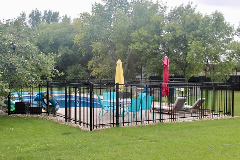 Ornamental Fence Around A Pool