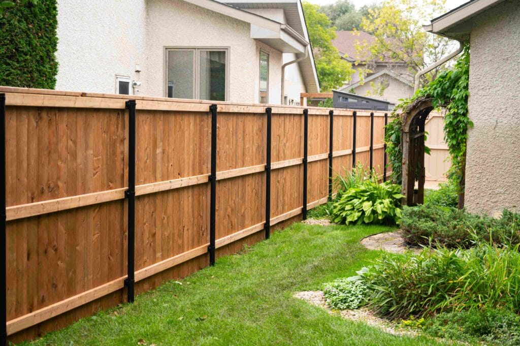 Wood Fence With Black Posts
