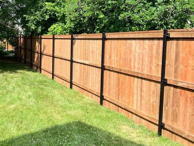 Wood Fence With Black Steel Posts