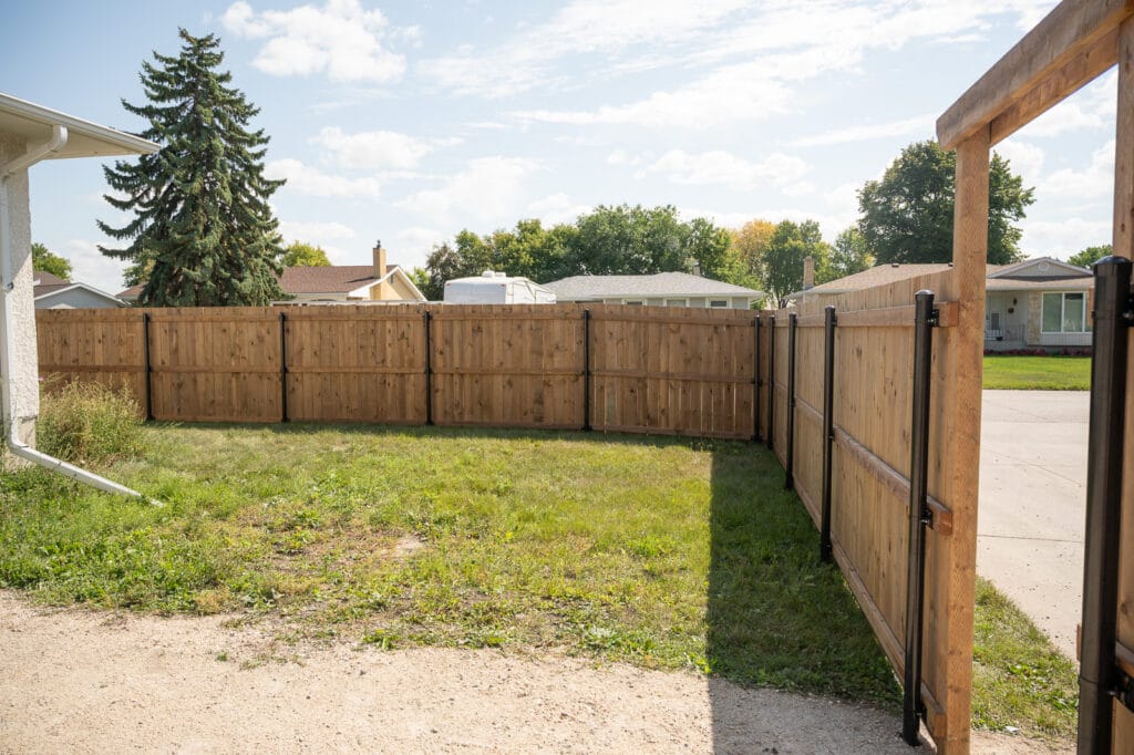 Wood Fence With Black Steel Posts
